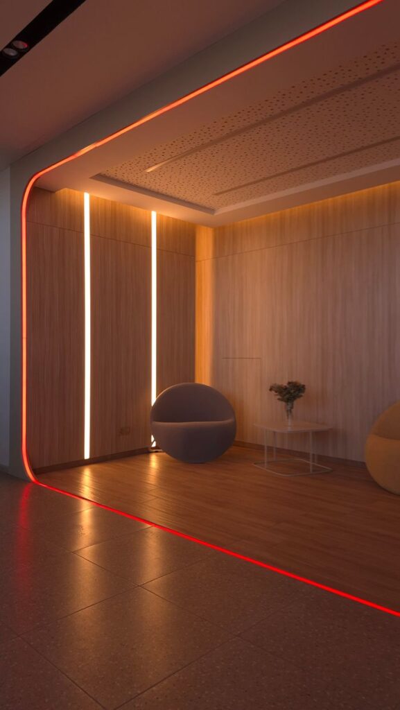 A stylish lobby area featuring ambient lighting and contemporary decor, providing a warm and inviting atmosphere.